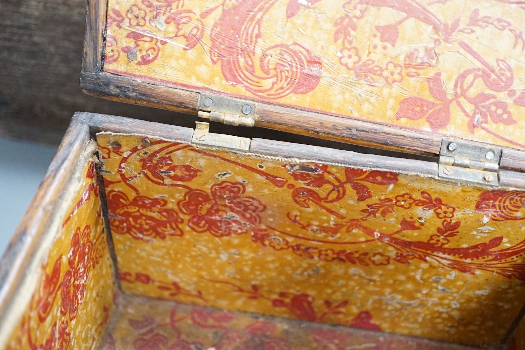 An early 18th century oak bible box containing a Victorian Morocco leather photograph album, together with two 19th century wooden boxes (4)